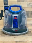 Bissell 2694 Spotclean Proheat Portable And Stain Carpet Cleaner, Purple. Fixed Price $75.00.
