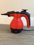 Handheld Steam Cleaner With 9-PC Accessories Safety Lock Button Open Box. Fixed Price $23.00.