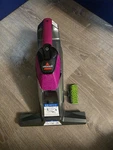 Pink Bissell Stain Eraser Cordless Carpet & Upholstery Cleaner Model 2002Q. Fixed Price $74.99.