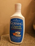 Corning Cleaner & Conditioner Polish 16 Oz. Bottle Half Full. Fixed Price $14.00.