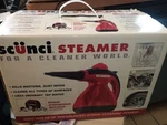 Scunci Steamer Red Handheld Cleaner World: Remove Wrinkles, Cleans Grout. Fixed Price $79.99.