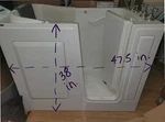 Gently Used American Standard Walk-in Whirlpool Tub With Built Seat. Fixed Price $2500.00.