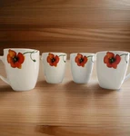 Set 4 Porcelain Corsica Home Poppy Coffee Tea Mugs. New, Original Box. Fixed Price $24.75.