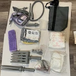 Shark Steam Cleaner, Model SC630W W/ Tote Bag & Cleaning Pouches And Manual. Fixed Price $75.00.