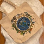 Eco-friendly Natural Canvas Tote Bag With Earth And Wildlife Design. Fixed Price $33.00.