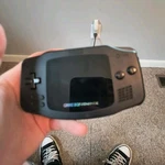 Nintendo Game Boy Advance Black Handheld System. Fixed Price $185.00.