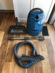 Titan T9200 Canister Vacuum Cleaner With Hose, Wand & T9500 Power Nozzle Head. Fixed Price $99.99.