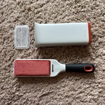 Oxo Good Grips Cleaning Furlifter Furniture Brush. Fixed Price $15.00.