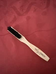 The Laundress: Stain Brush. Fixed Price $14.99.