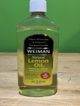 Weiman Natural Lemon Oil Furniture Wood Polish With Sunscreen 16 Oz Open Bottle. Fixed Price $24.99.