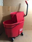 Rubbermaid Red Wavebrake 35-QT Mop Bucket & Wringer **. Fixed Price $109.99.